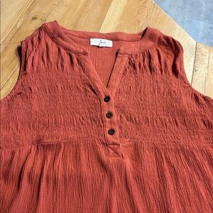 Super flattering sleeveless blouse